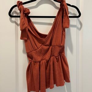 Amaryllis rust colored bow cinched tank size Small